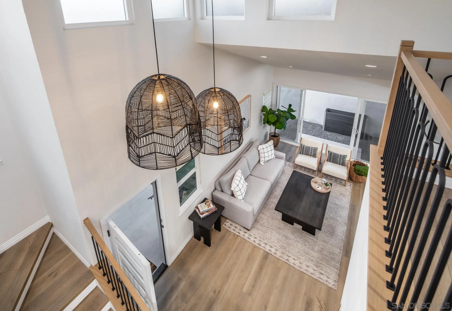 588 Melba Road Encinitas, CA 92024 - Photo 2 of 23 a living room with furniture and a mirror
