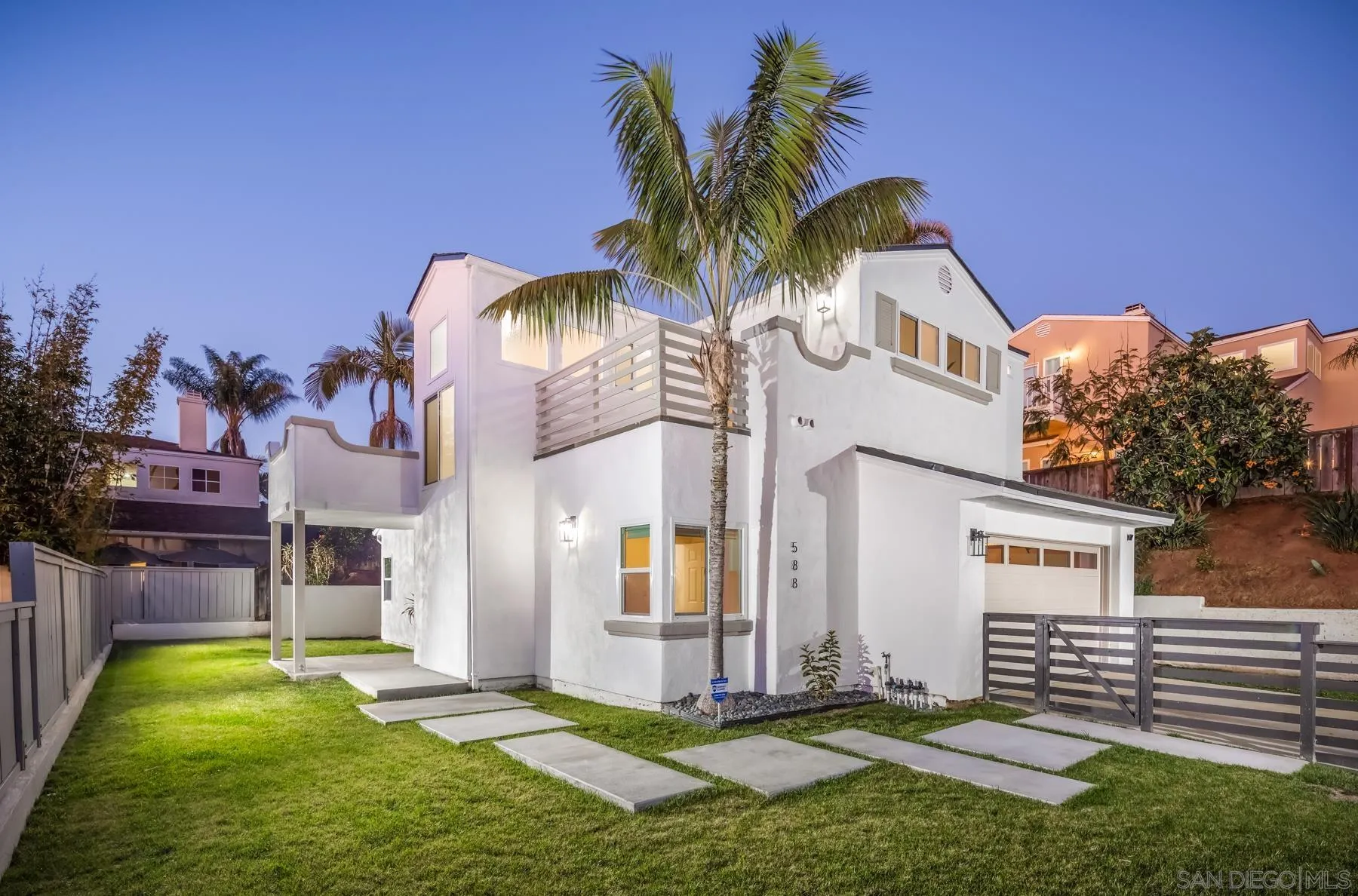 588 Melba Road Encinitas, CA 92024 - Photo 23 of 23 a front view of a house with a yard