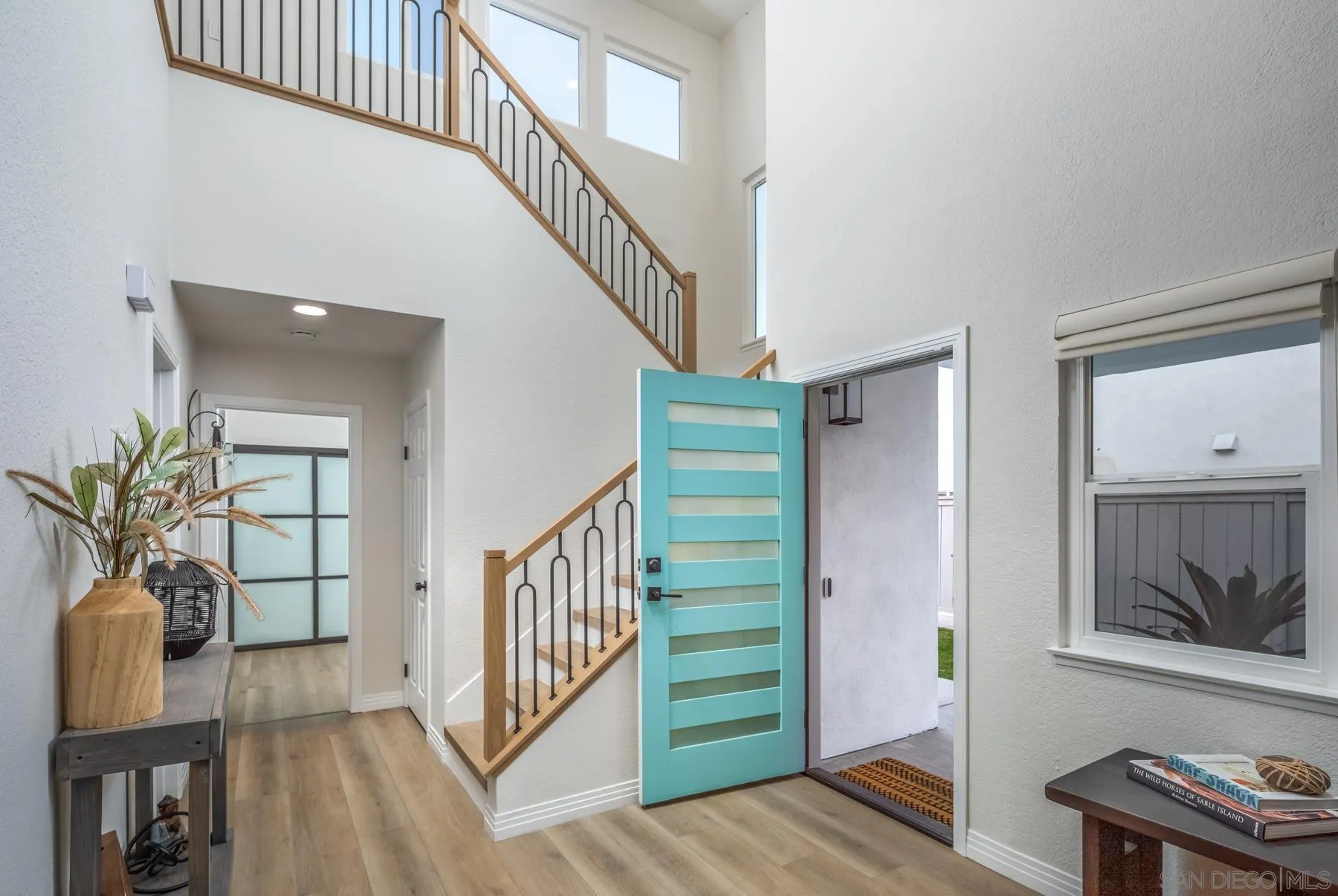 588 Melba Road Encinitas, CA 92024 - Photo 10 of 23 a view of entryway and hall with wooden floor