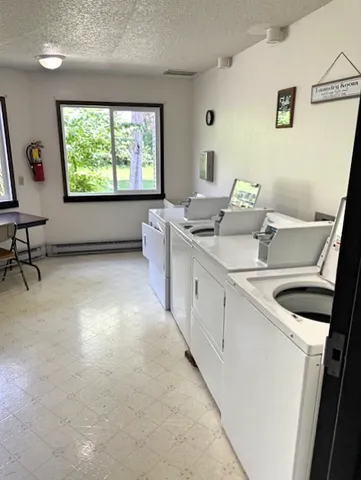 a kitchen with a sink and a window