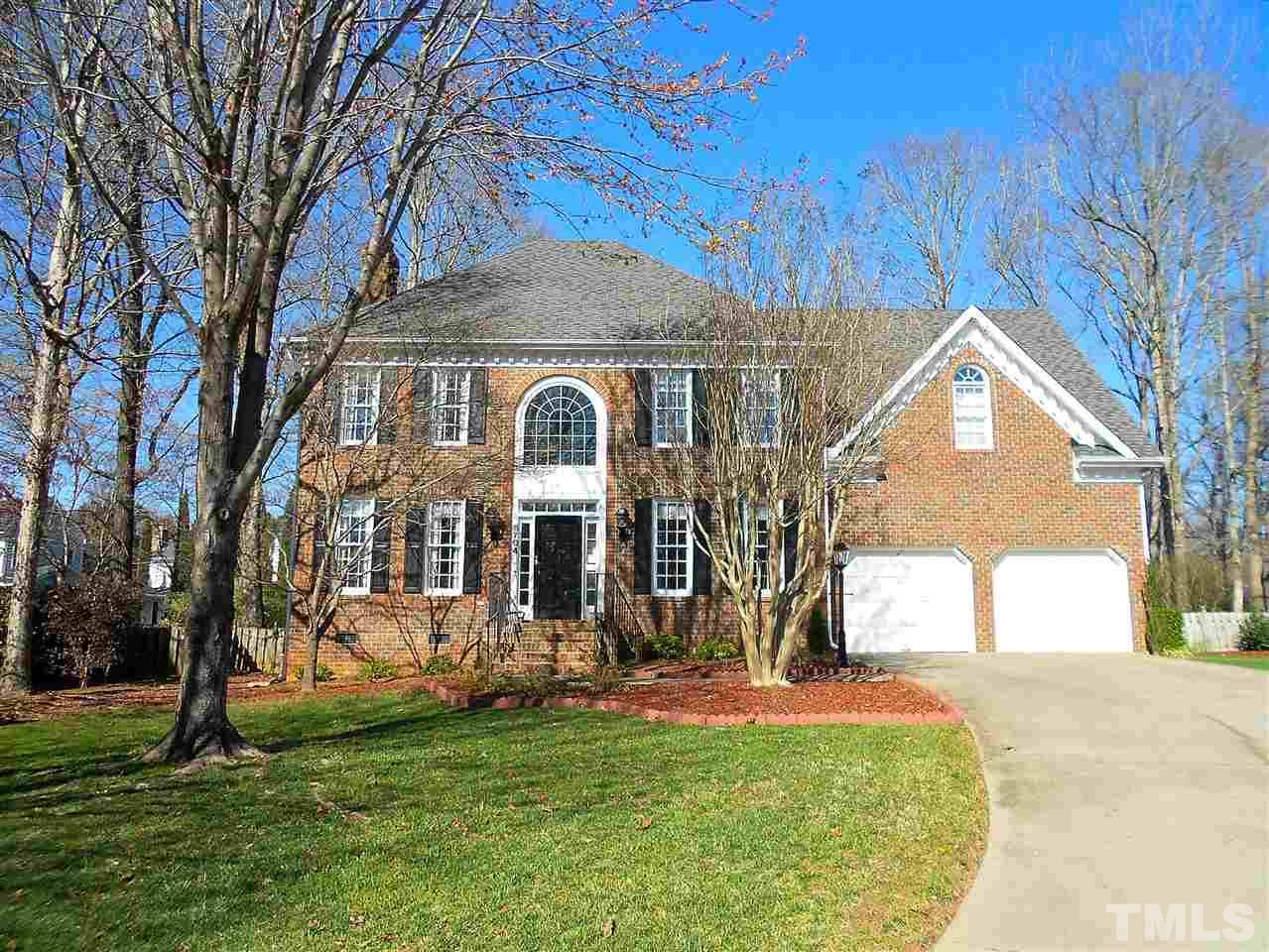 8704 Aldersgate Way Raleigh, NC 27615 - Photo 1 of 25 a view of a house with a yard