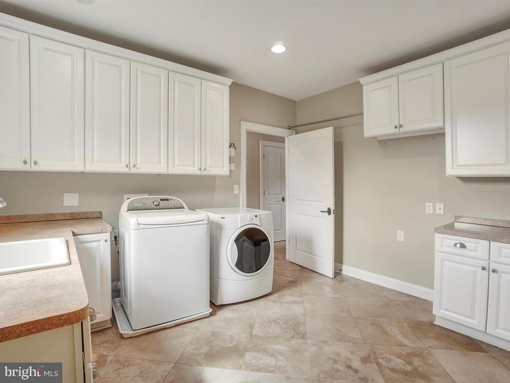 2131 Dixon Road Frederick, MD 21704 - Photo 30 of 65 Laundry with lots of built ins!
