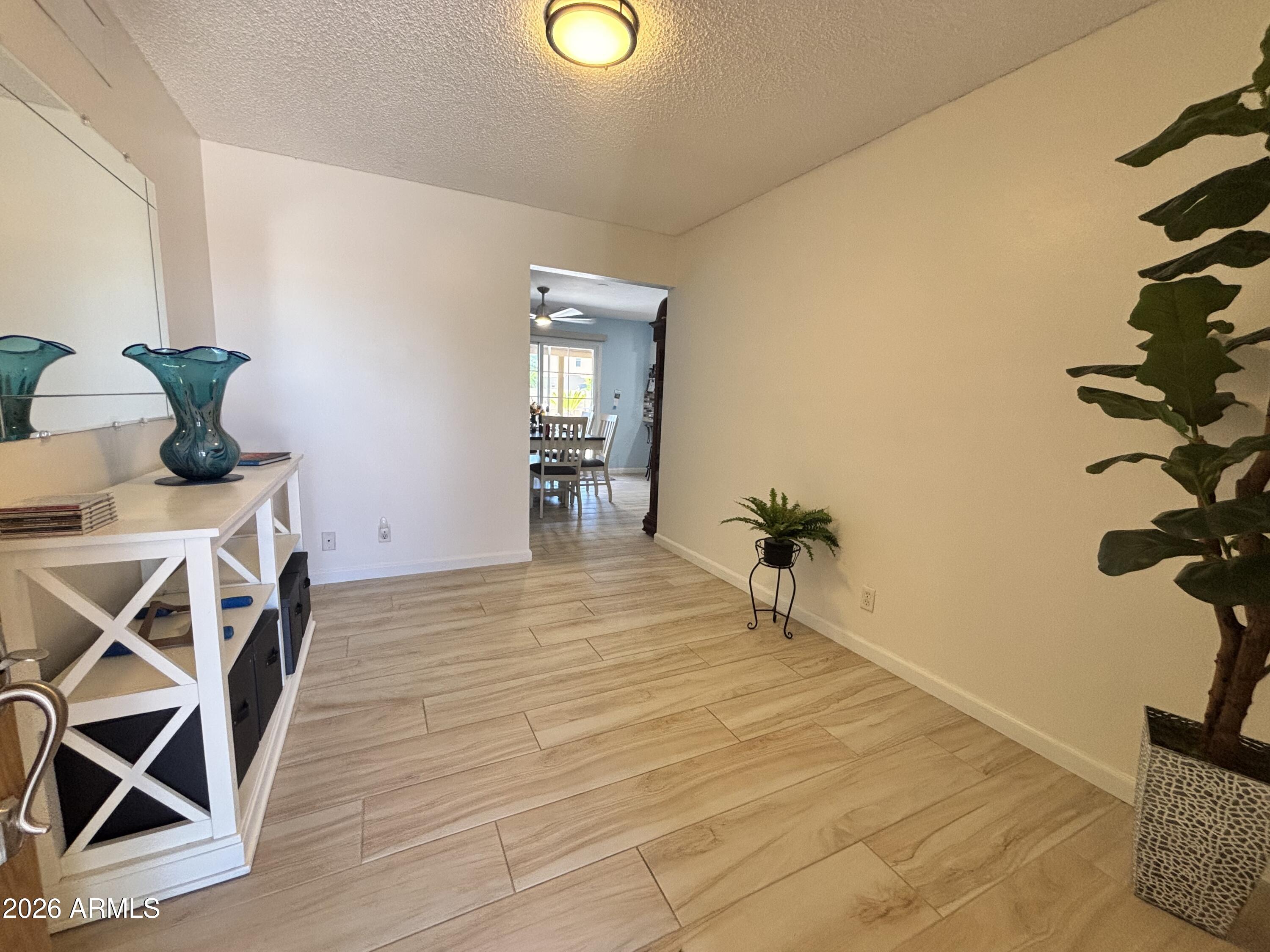 7745 East Mangun Road Mesa, AZ 85207 - Photo 17 of 35 a room that has a bed and a chair in it