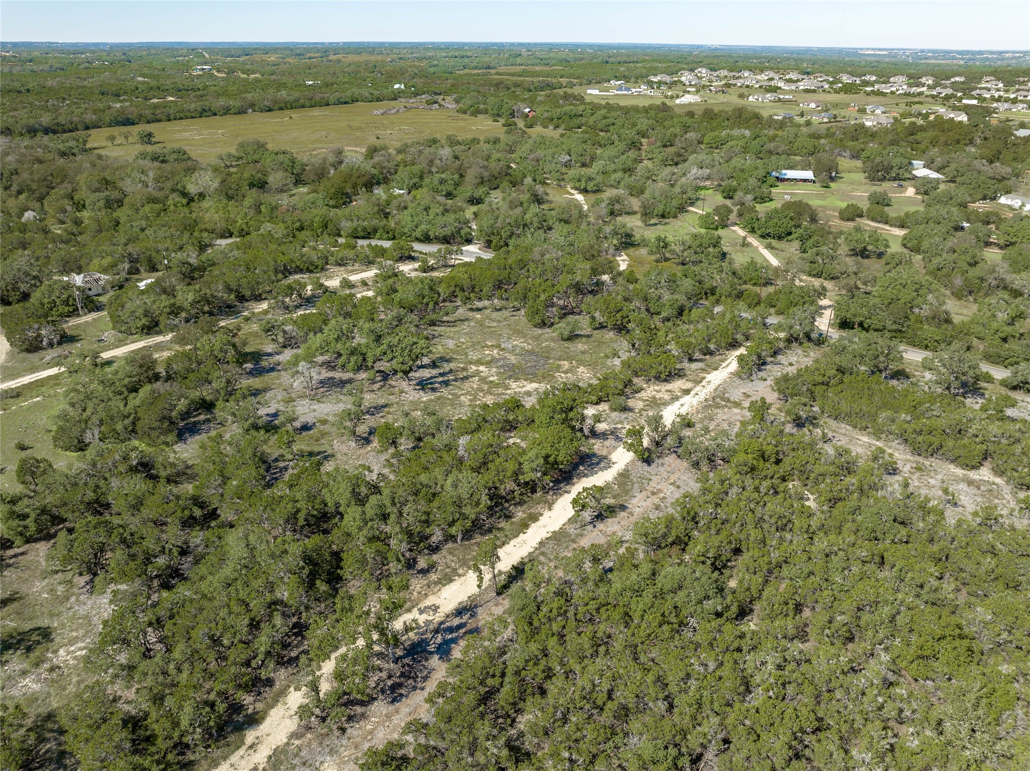 281 County Road 281 Leander, TX 78641 - Photo 23 of 31 an aerial view of residential houses with outdoor space and trees