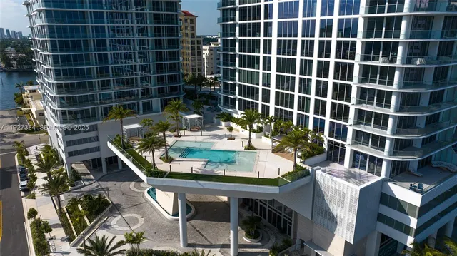a front view of a building with a street