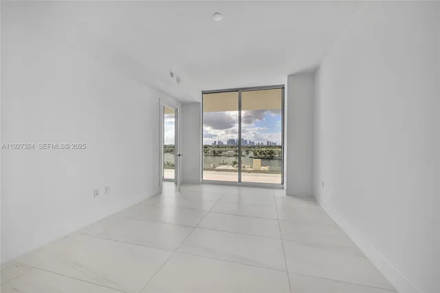 a view of a lake with palm trees
