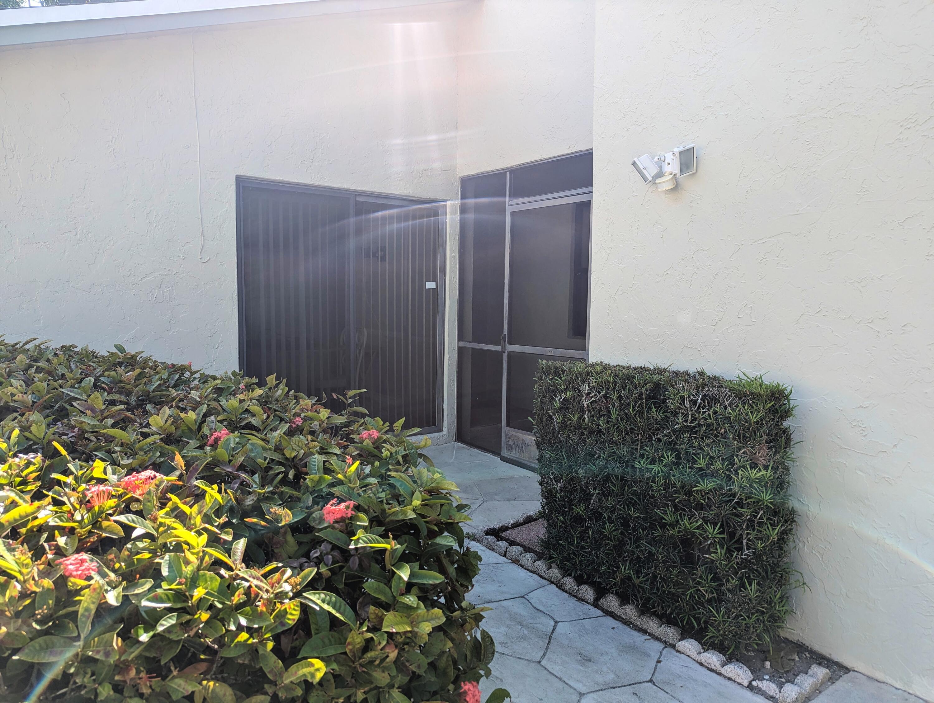 2454 Northwest 9th Street Delray Beach, FL 33445 - Photo 6 of 53 Entry Walkway