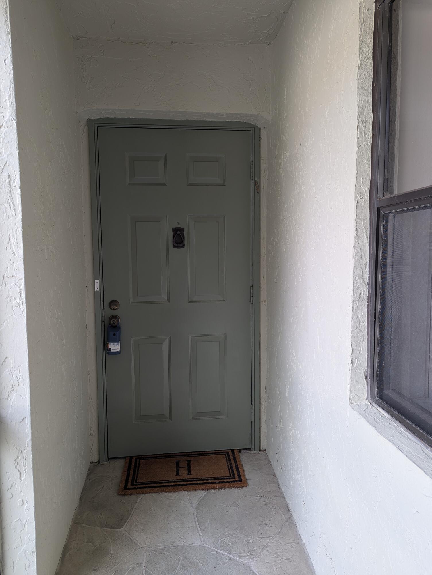 2454 Northwest 9th Street Delray Beach, FL 33445 - Photo 8 of 53 Covered Entry