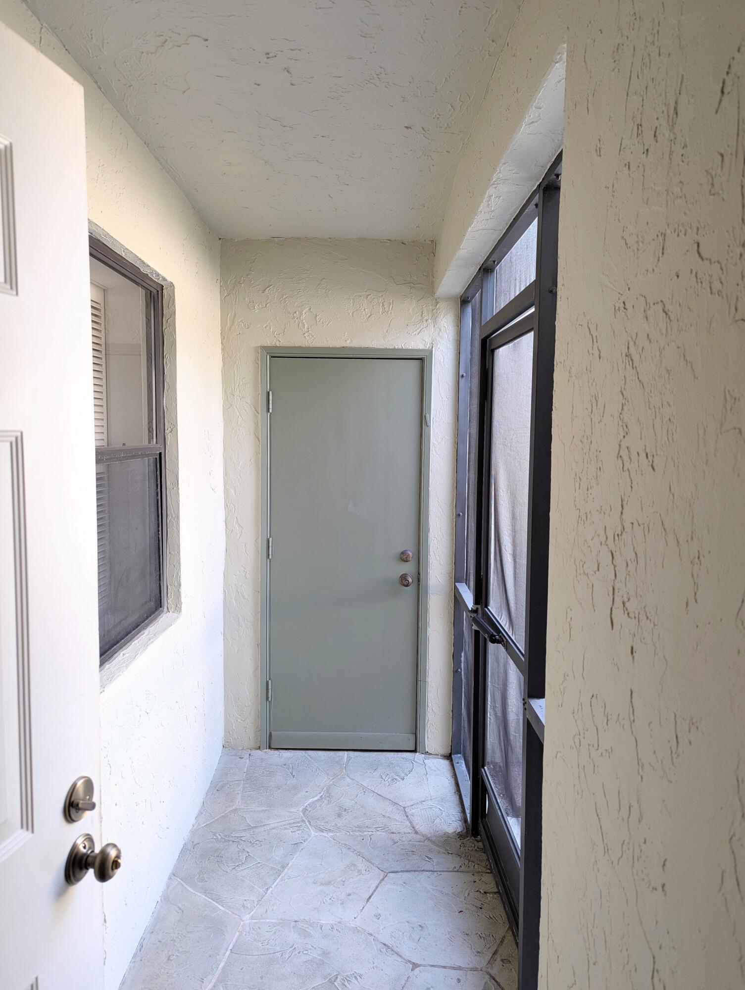 2454 Northwest 9th Street Delray Beach, FL 33445 - Photo 9 of 53 Covered Entry