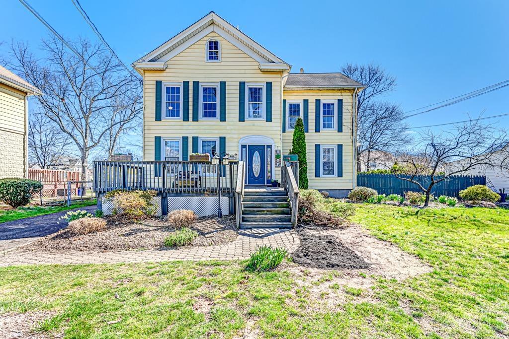 387 Prospect Avenue Dunellen, NJ 08812 - Photo 1 of 34 a front view of a house with a yard