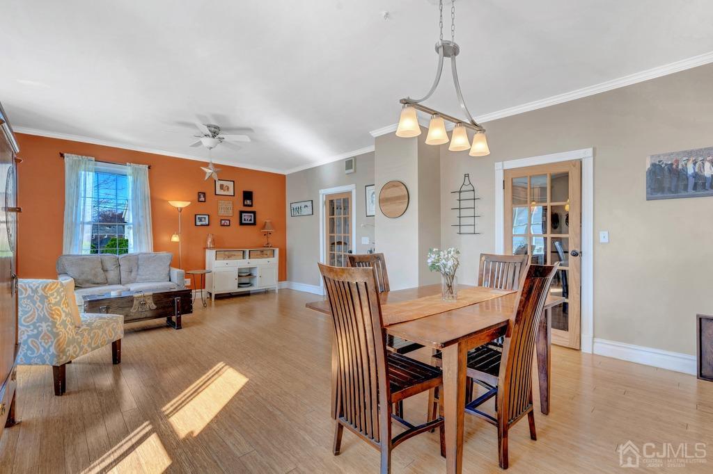 387 Prospect Avenue Dunellen, NJ 08812 - Photo 13 of 34 a view of a dining room with furniture window and wooden floor