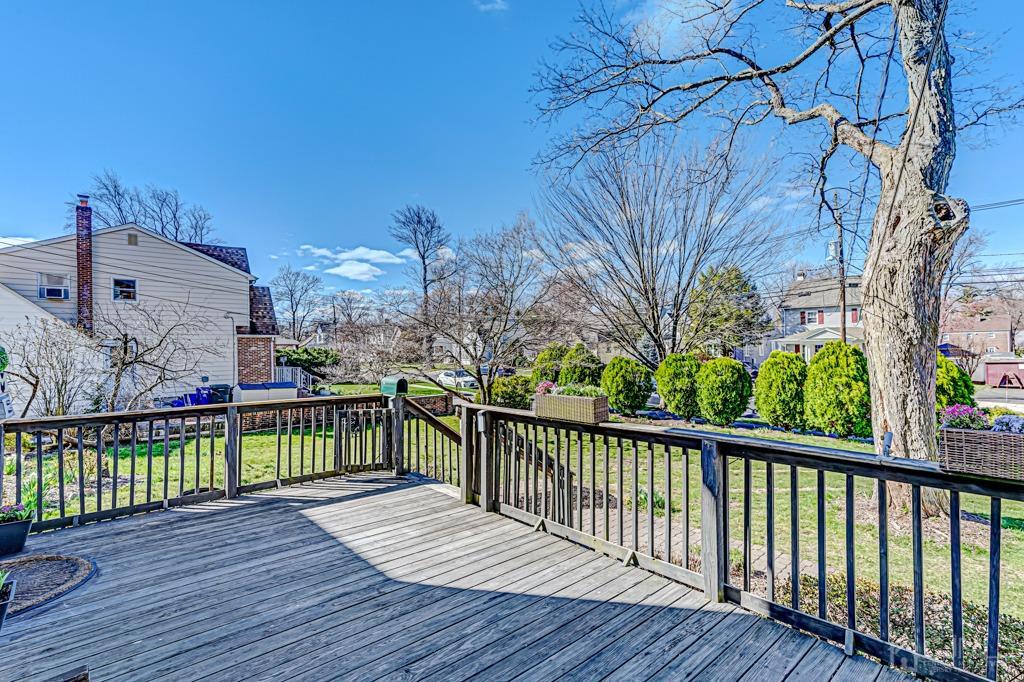 387 Prospect Avenue Dunellen, NJ 08812 - Photo 26 of 34 a view of a wooden deck with a yard