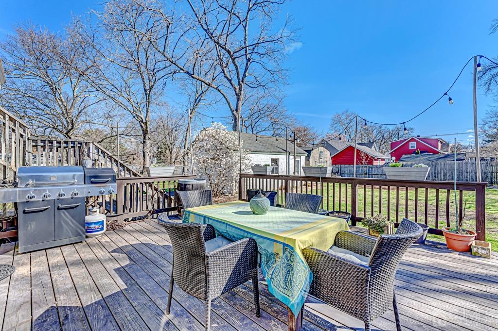 387 Prospect Avenue Dunellen, NJ 08812 - Photo 27 of 34 a view of a chairs and table on the deck