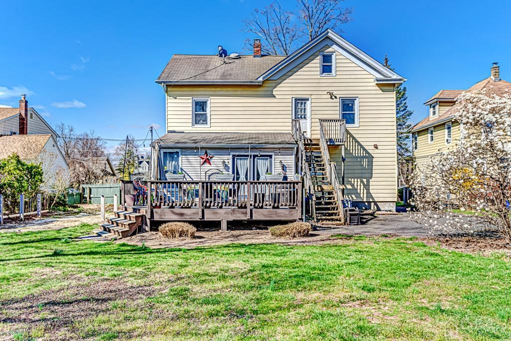 387 Prospect Avenue Dunellen, NJ 08812 - Photo 31 of 34 a view of a house with a yard and sitting area