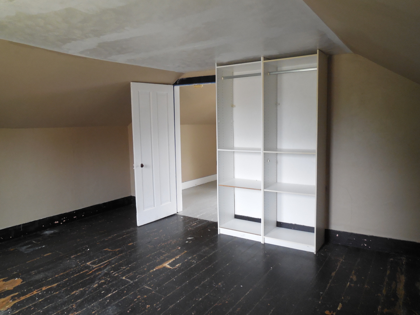 302 East Park Street Morrison, IL 61270 - Photo 12 of 15 a view of an empty room with wooden floor and closet
