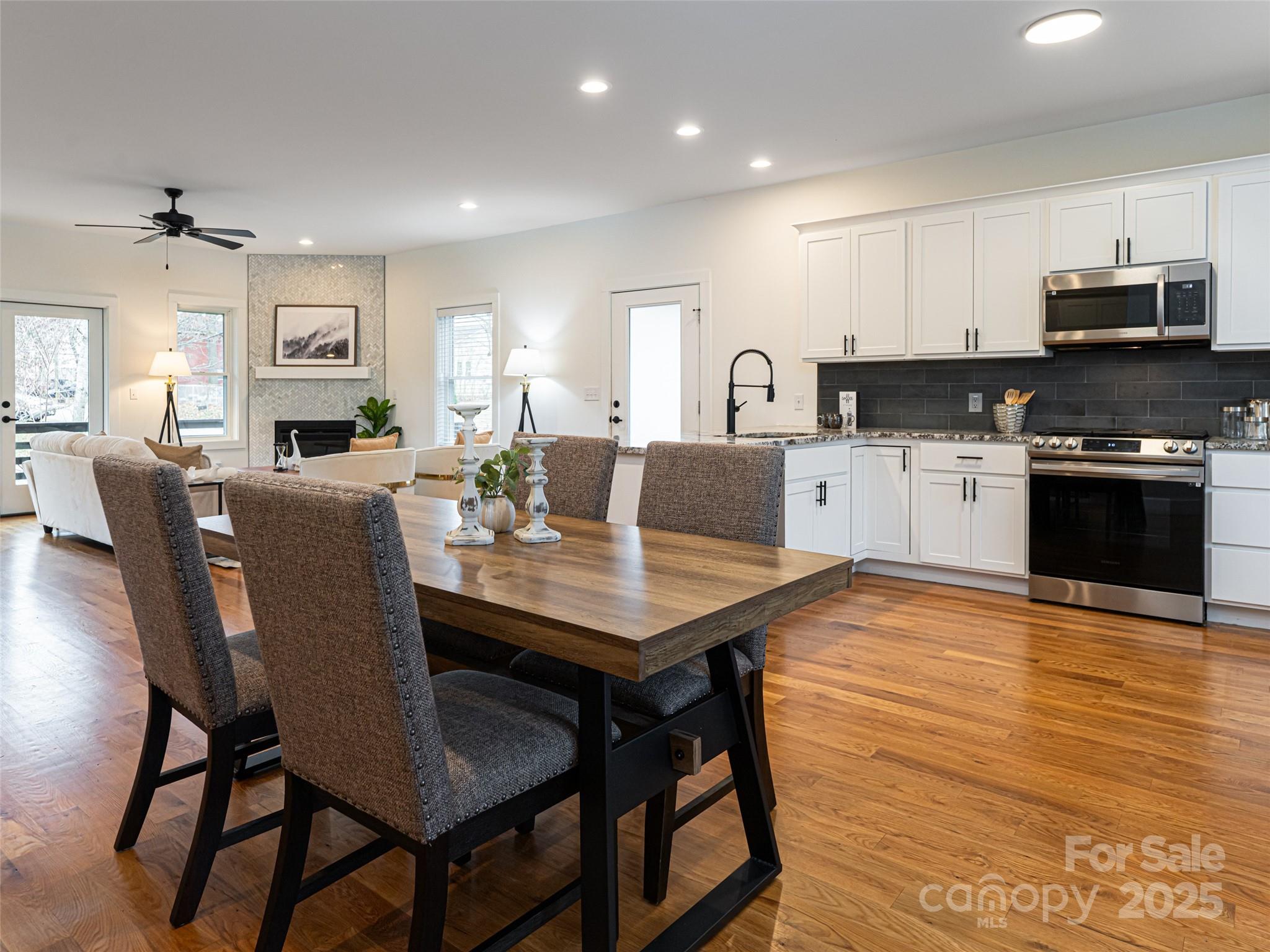 197 Chatham Road Asheville, NC 28804 - Photo 16 of 46 a view of a dining room with furniture
