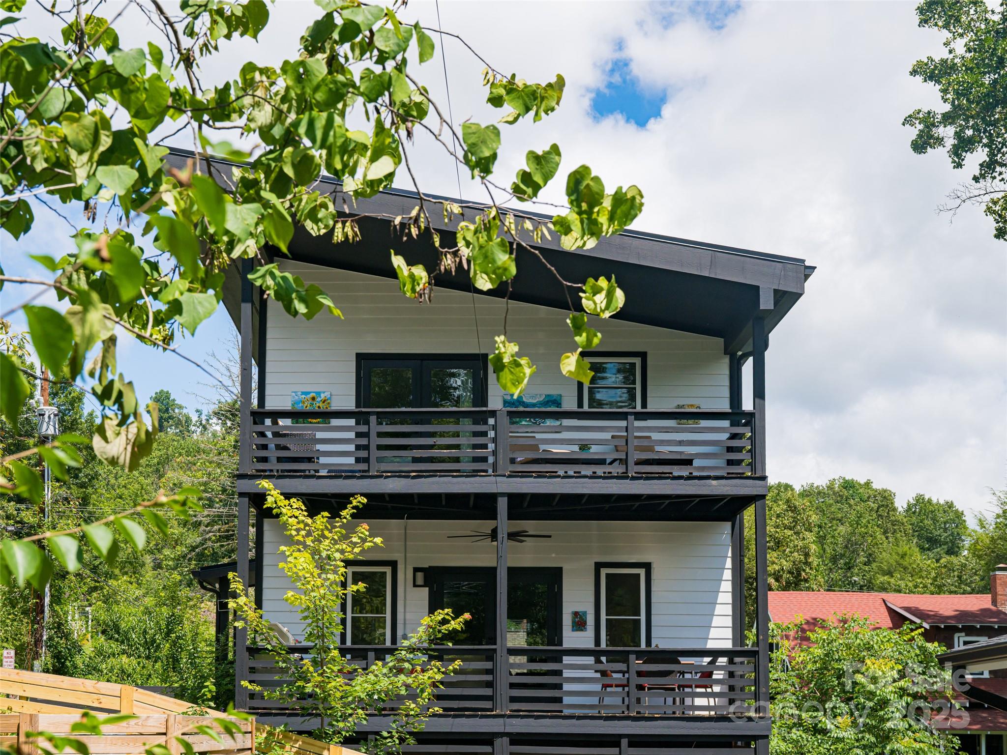 197 Chatham Road Asheville, NC 28804 - Photo 17 of 46 a front view of a house with a yard