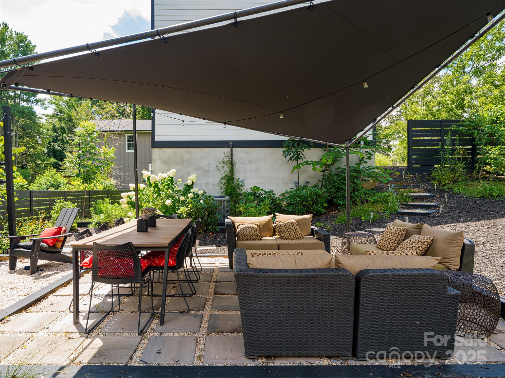 197 Chatham Road Asheville, NC 28804 - Photo 20 of 46 a outdoor living space with furniture and garden view