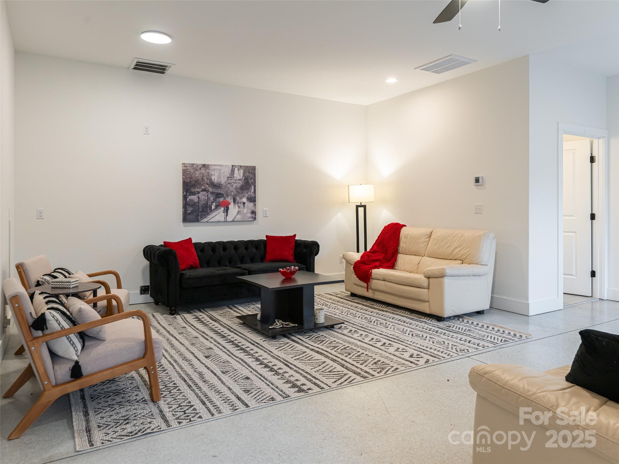 197 Chatham Road Asheville, NC 28804 - Photo 32 of 46 a theatre with furniture and a couch