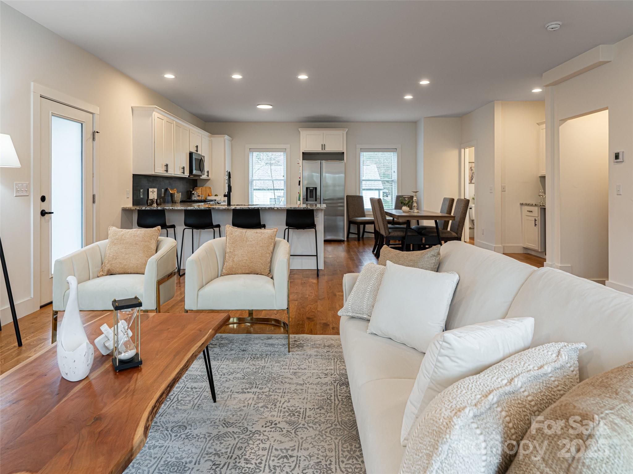 197 Chatham Road Asheville, NC 28804 - Photo 6 of 46 a living room with furniture kitchen and a table