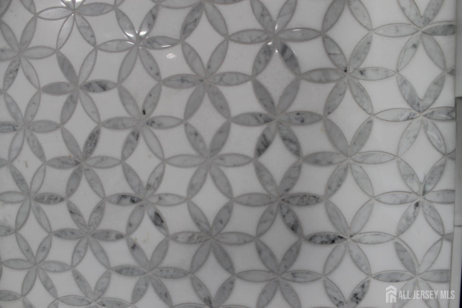 1 Sussex Road East Brunswick, NJ 08816 - Photo 15 of 60 a close up of a white marble