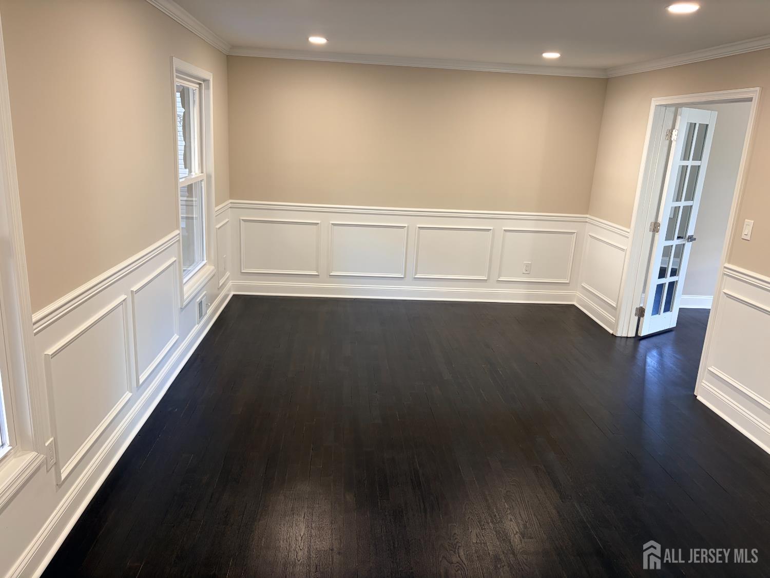 1 Sussex Road East Brunswick, NJ 08816 - Photo 23 of 60 wooden floor in an empty room with a window