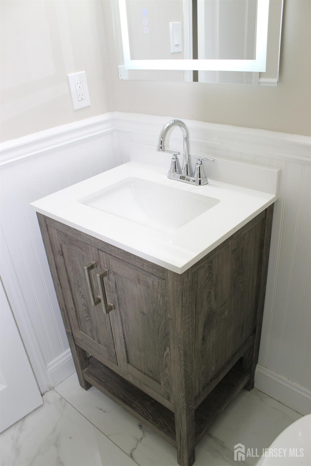 1 Sussex Road East Brunswick, NJ 08816 - Photo 31 of 60 a utility room with a sink