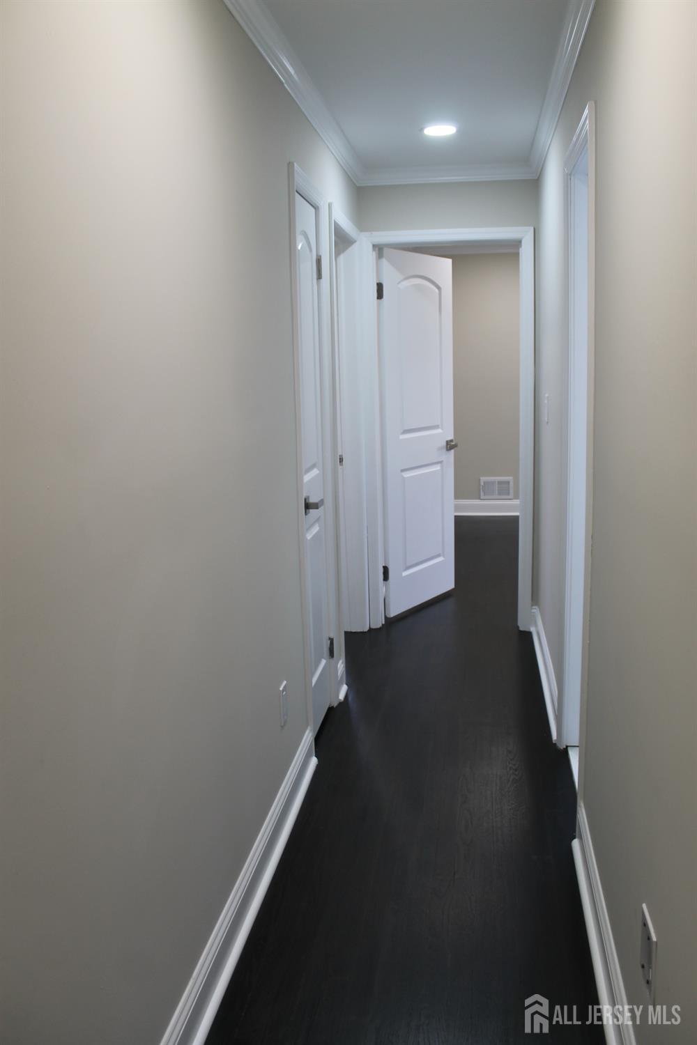1 Sussex Road East Brunswick, NJ 08816 - Photo 34 of 60 a view of a hallway
