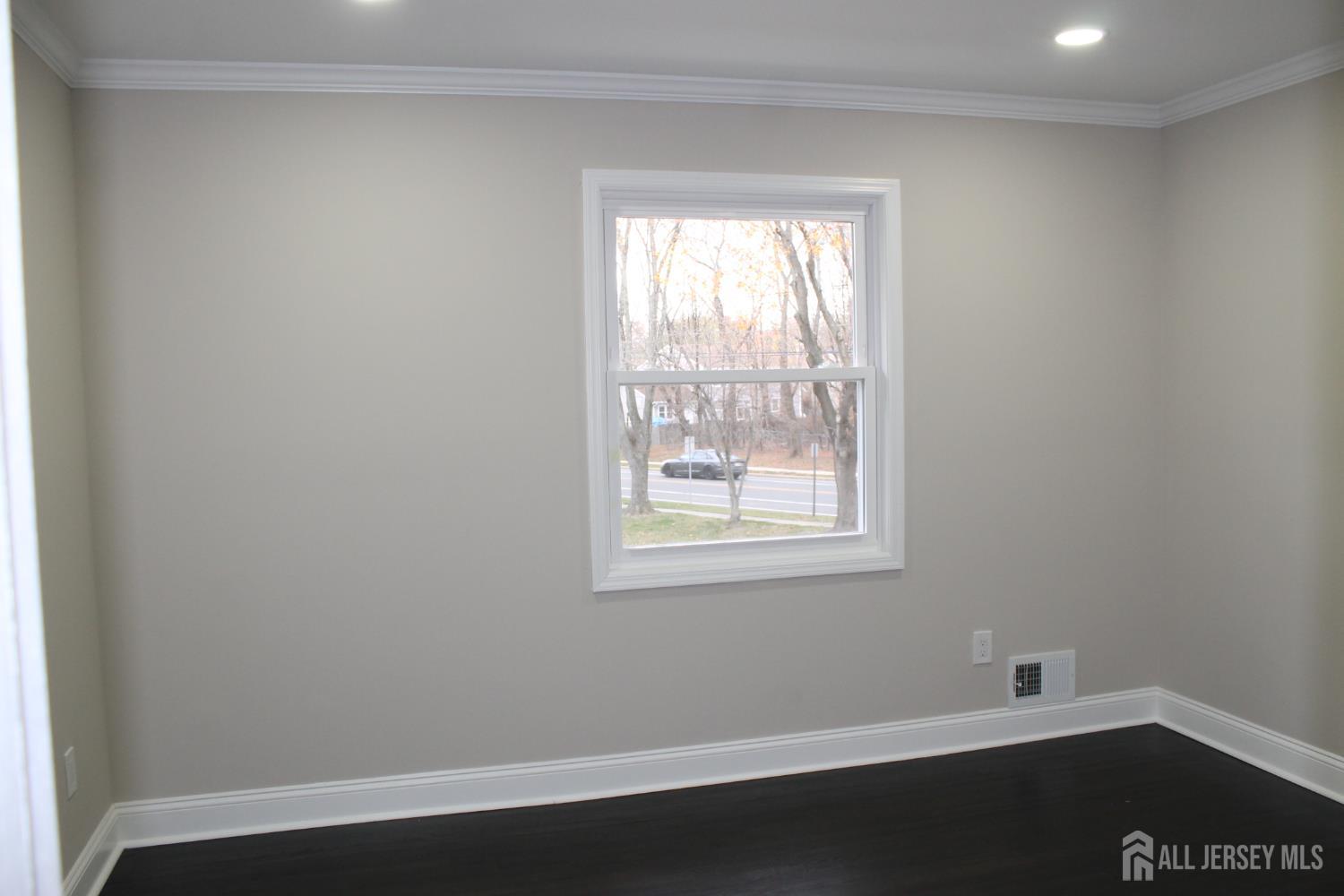 1 Sussex Road East Brunswick, NJ 08816 - Photo 38 of 60 an empty room with a window