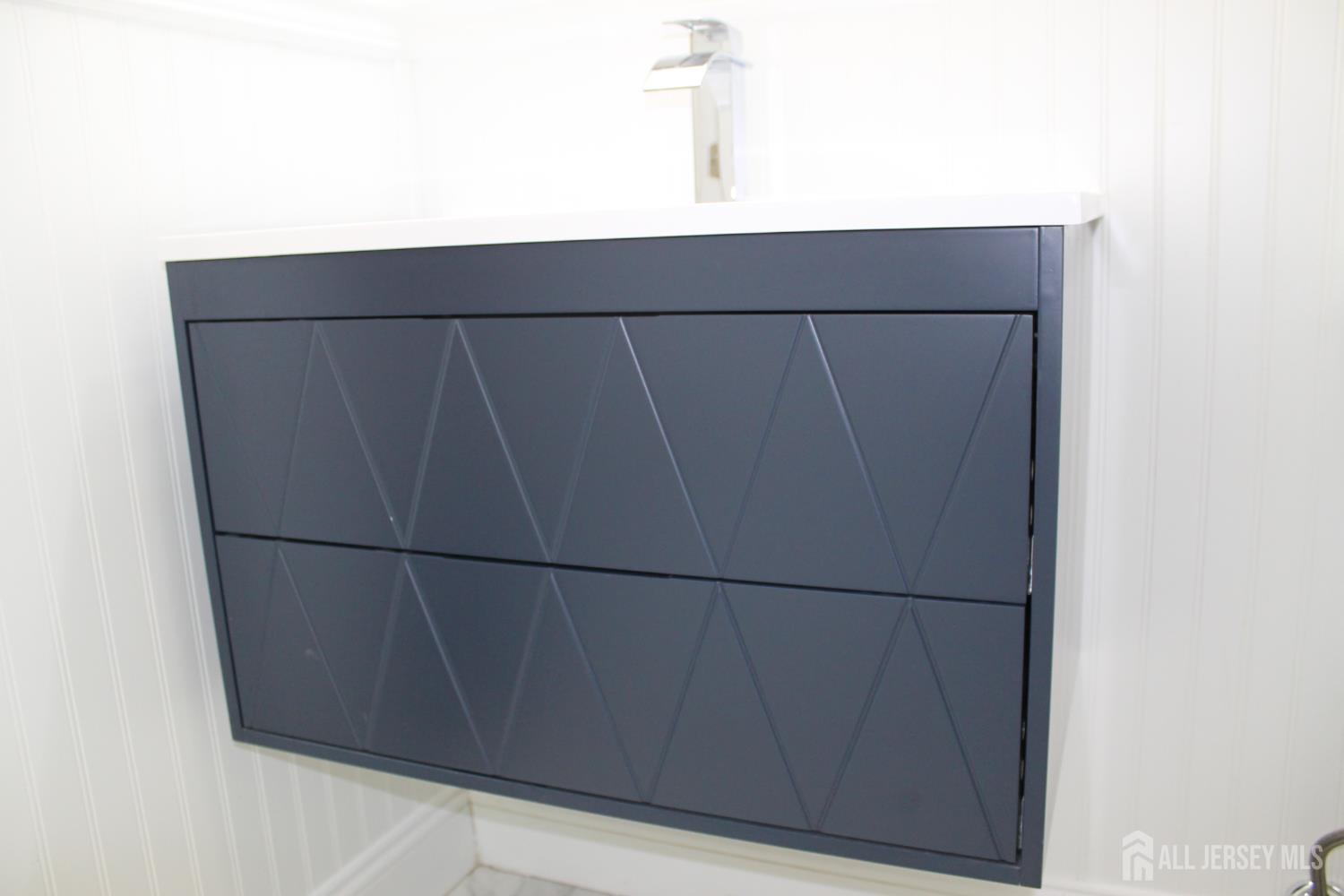 1 Sussex Road East Brunswick, NJ 08816 - Photo 43 of 60 a close view of wooden cabinets