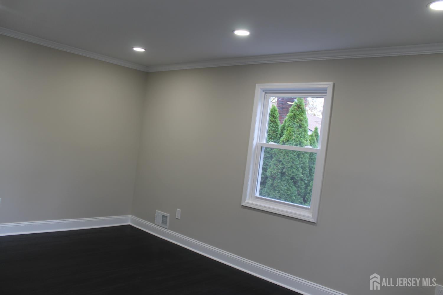 1 Sussex Road East Brunswick, NJ 08816 - Photo 45 of 60 an empty room with a window