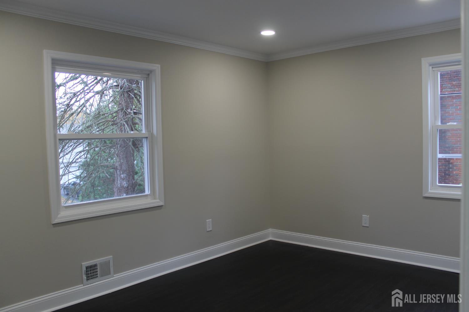 1 Sussex Road East Brunswick, NJ 08816 - Photo 46 of 60 an empty room with a window