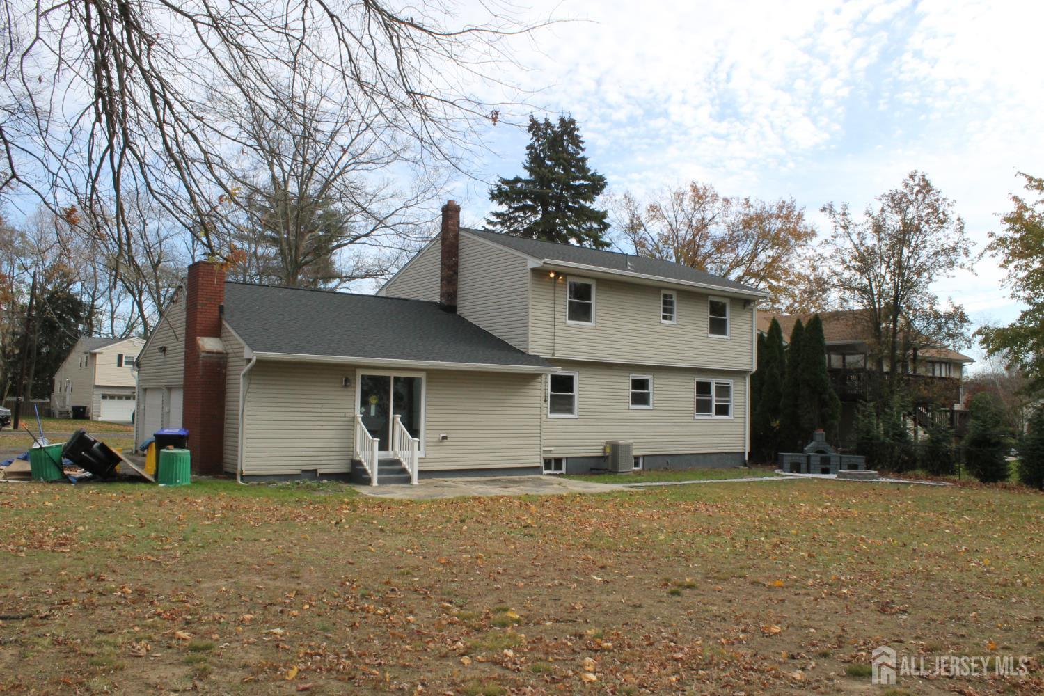 1 Sussex Road East Brunswick, NJ 08816 - Photo 56 of 60 a view of a house with backyard