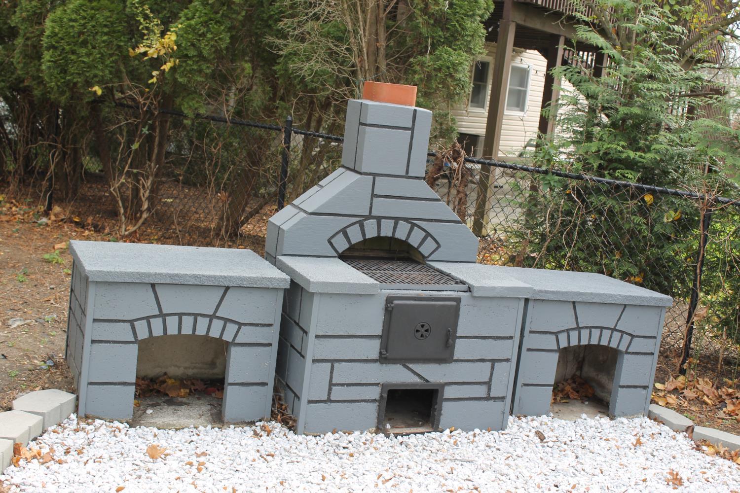 1 Sussex Road East Brunswick, NJ 08816 - Photo 58 of 60 a view of a chairs and table in backyard