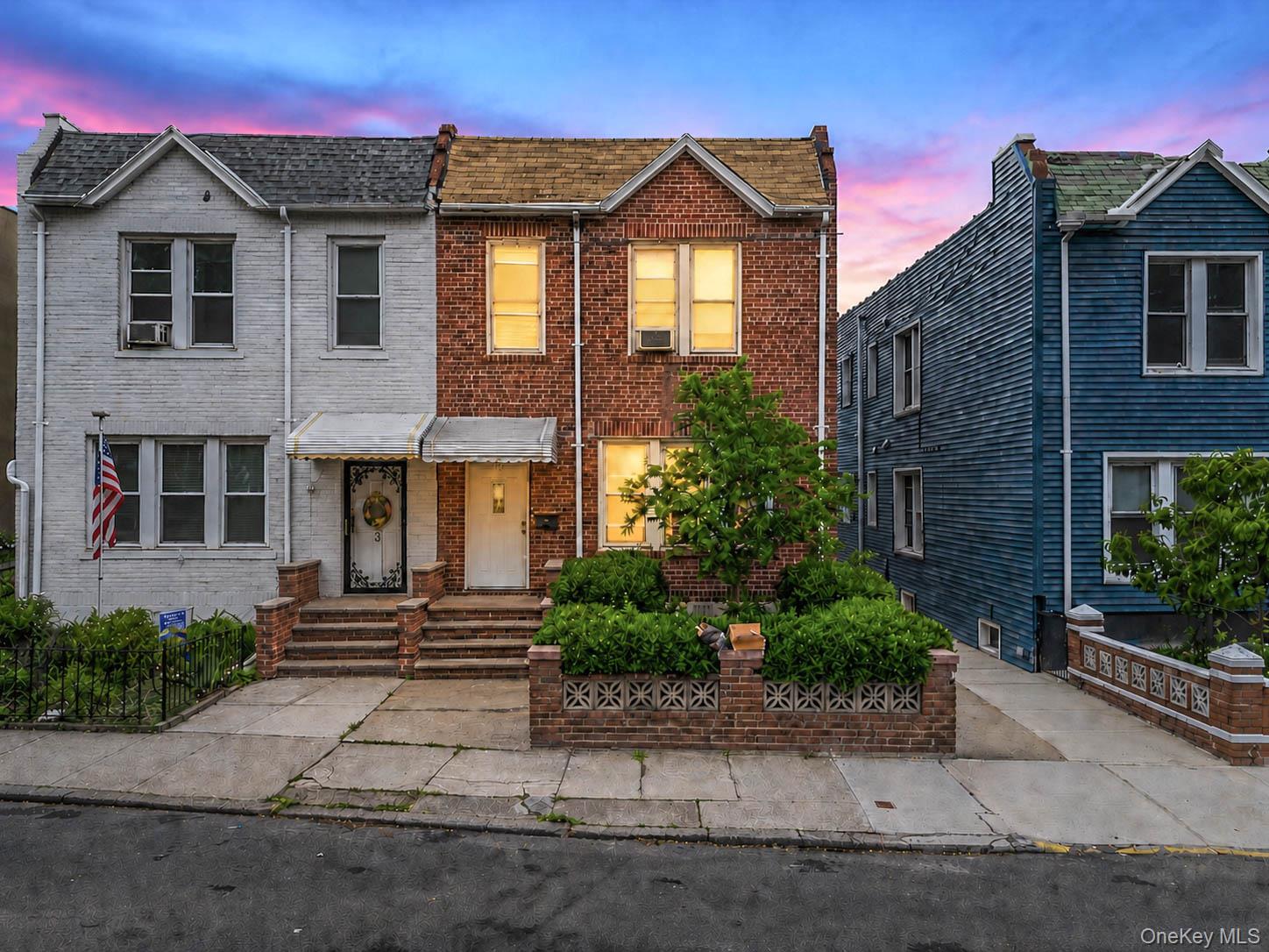 37-07 20th Road Queens, NY 11105 - Photo 2 of 24 a front view of a house