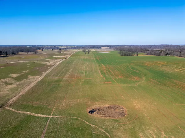 a view of a swimming pool with an ocean view