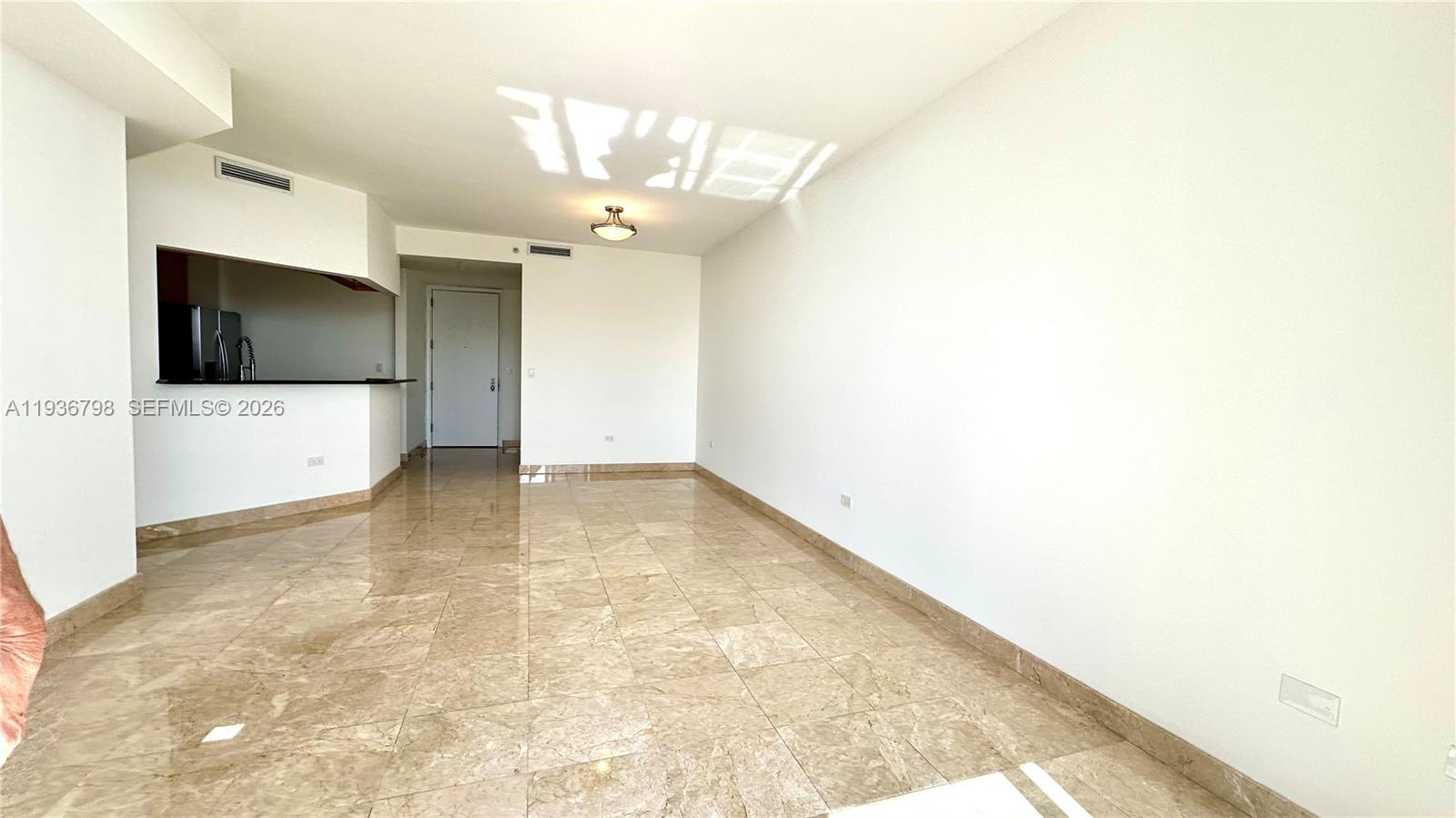 801 Brickell Key Boulevard, Unit 2707 Miami, FL 33131 - Photo 15 of 24 a view of a livingroom with furniture