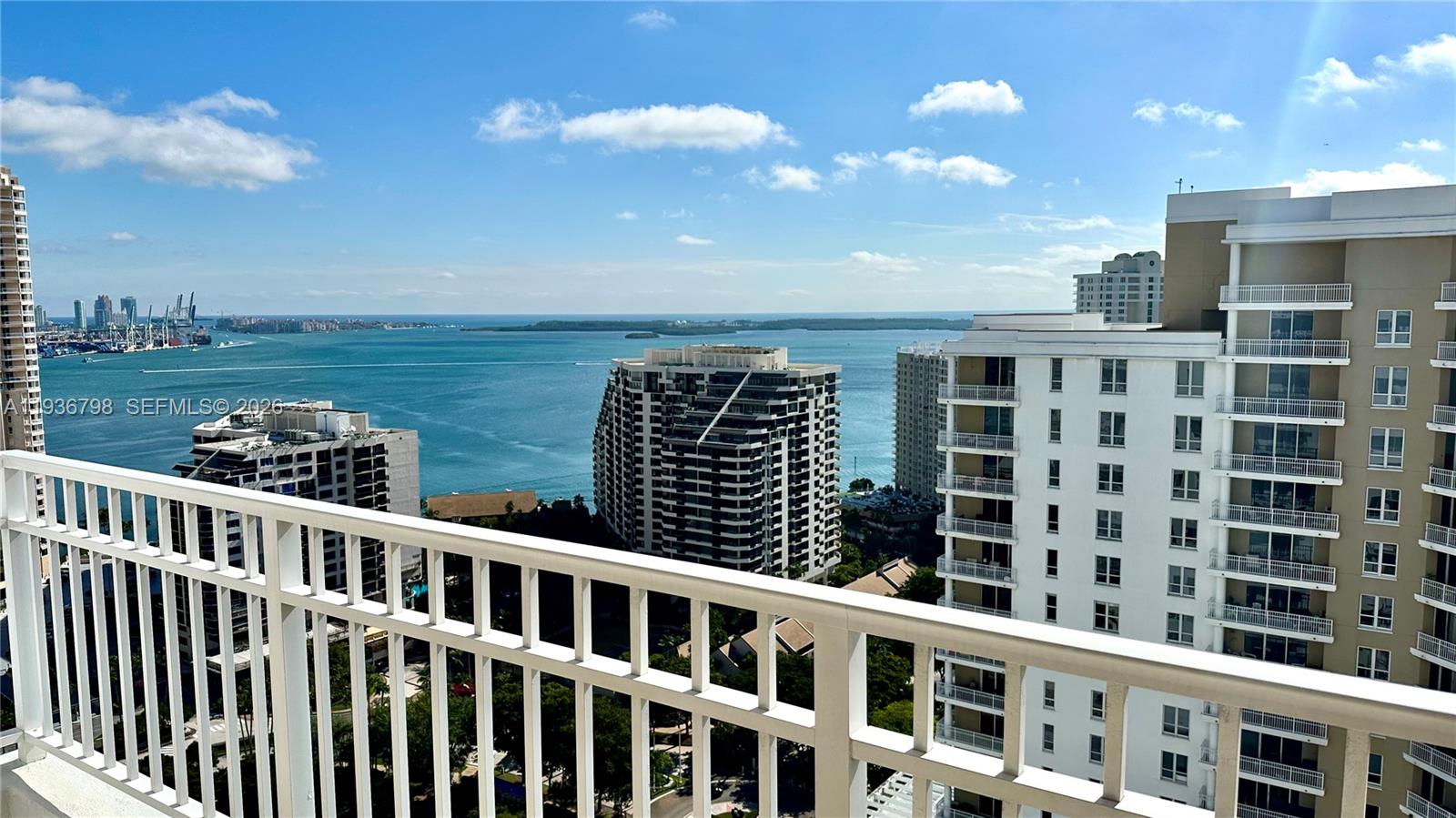 801 Brickell Key Boulevard, Unit 2707 Miami, FL 33131 - Photo 3 of 24 a view of a building from a balcony