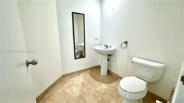 a view of balcony with furniture