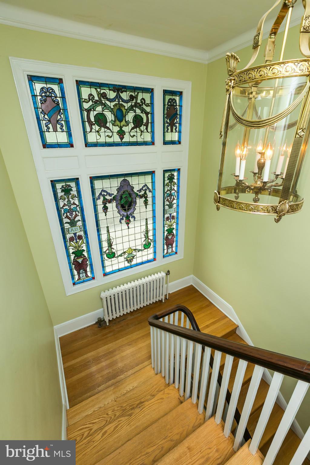 3812 Fenchurch Road Baltimore, MD 21218 - Photo 16 of 30 Stained Glass in Stairway