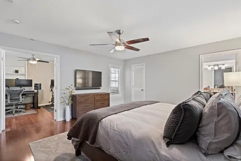 a bedroom with a bed and furniture