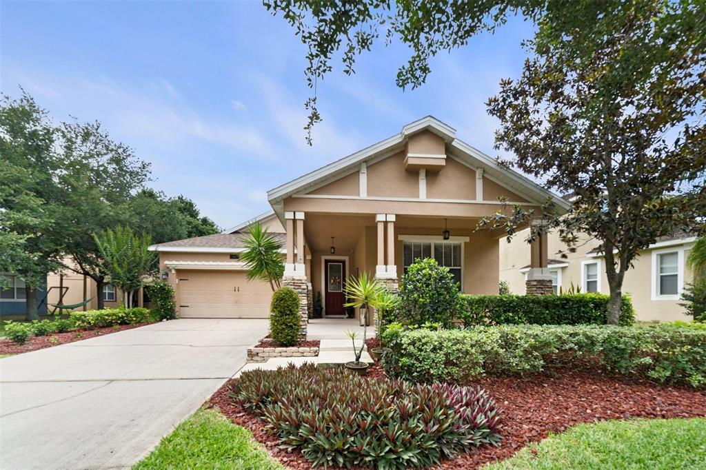 4827 Flint Road Windermere, FL 34786 - Photo 1 of 1 a front view of a house with a garden