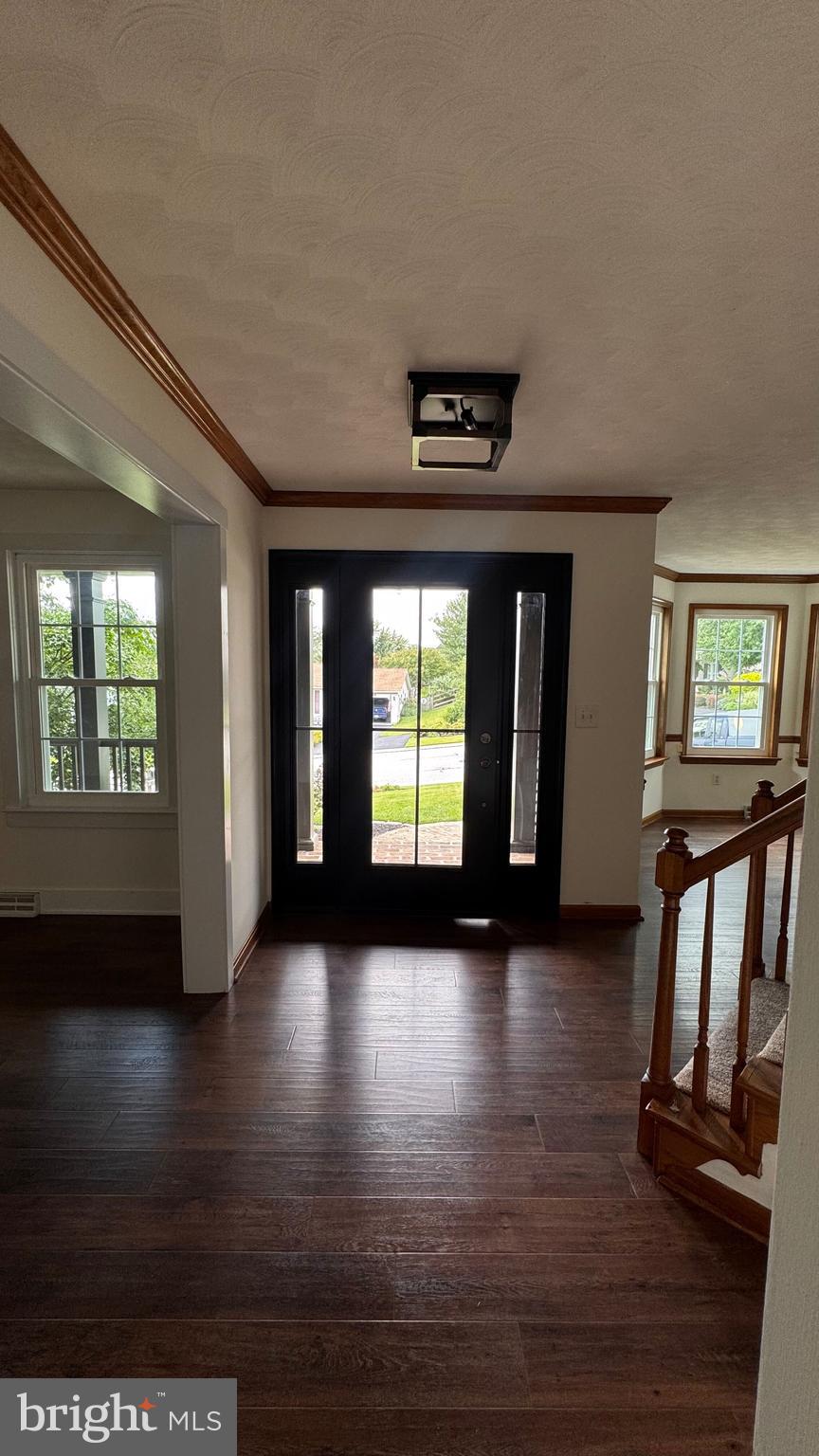 345 Jasmine Drive Hanover, PA 17331 - Photo 15 of 80 a view of an empty room with wooden floor and a window