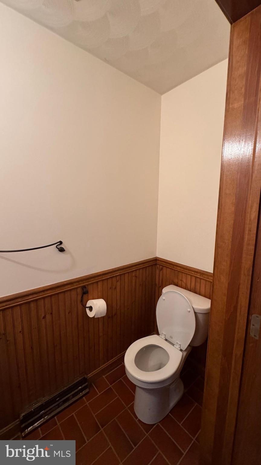 345 Jasmine Drive Hanover, PA 17331 - Photo 18 of 80 a bathroom with a toilet a sink and a mirror