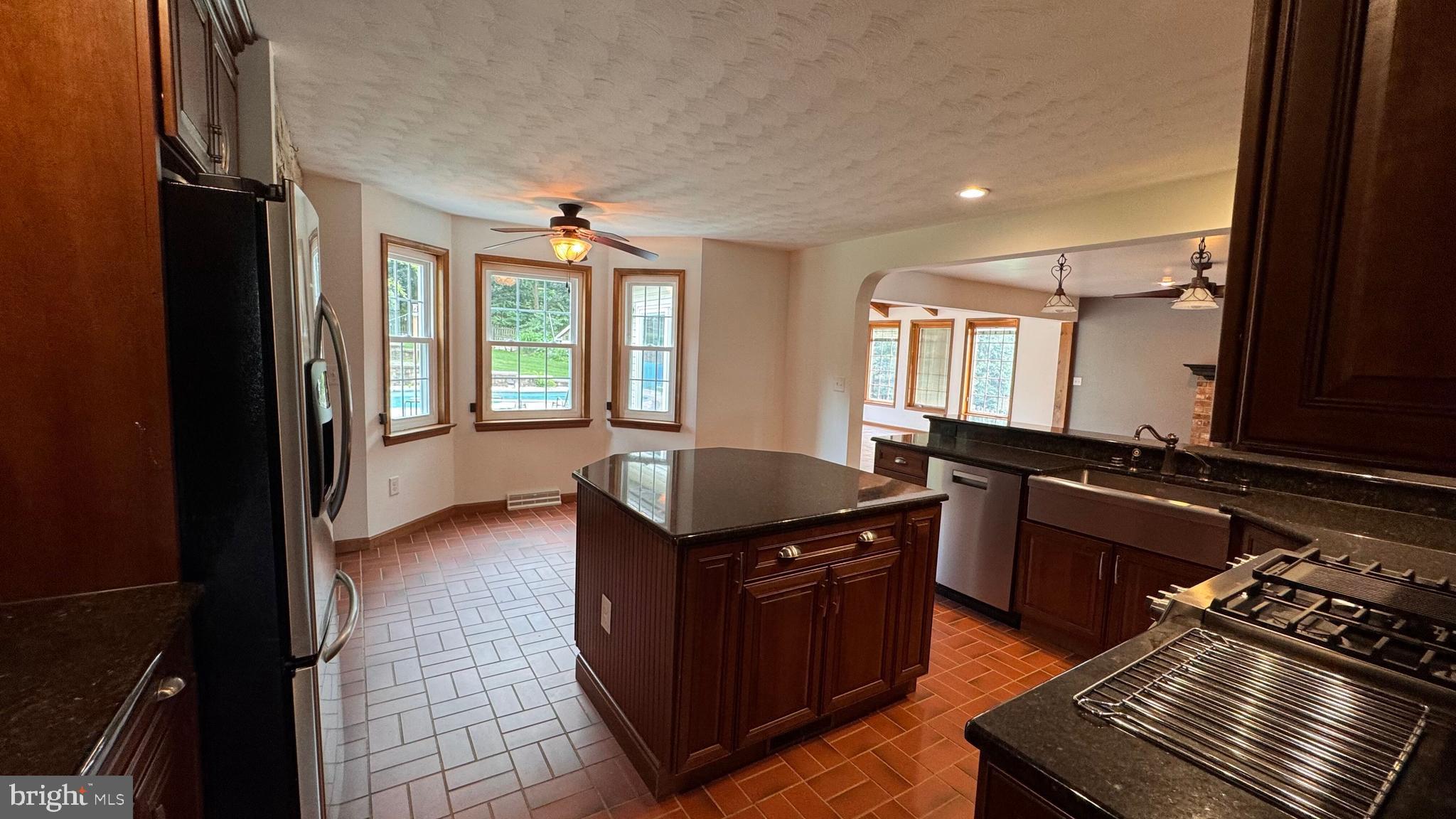 345 Jasmine Drive Hanover, PA 17331 - Photo 25 of 80 a kitchen with granite countertop a stove and a sink