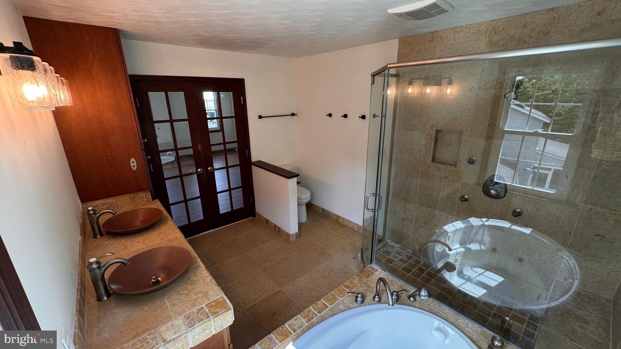 345 Jasmine Drive Hanover, PA 17331 - Photo 52 of 80 a bathroom with a sink toilet and shower