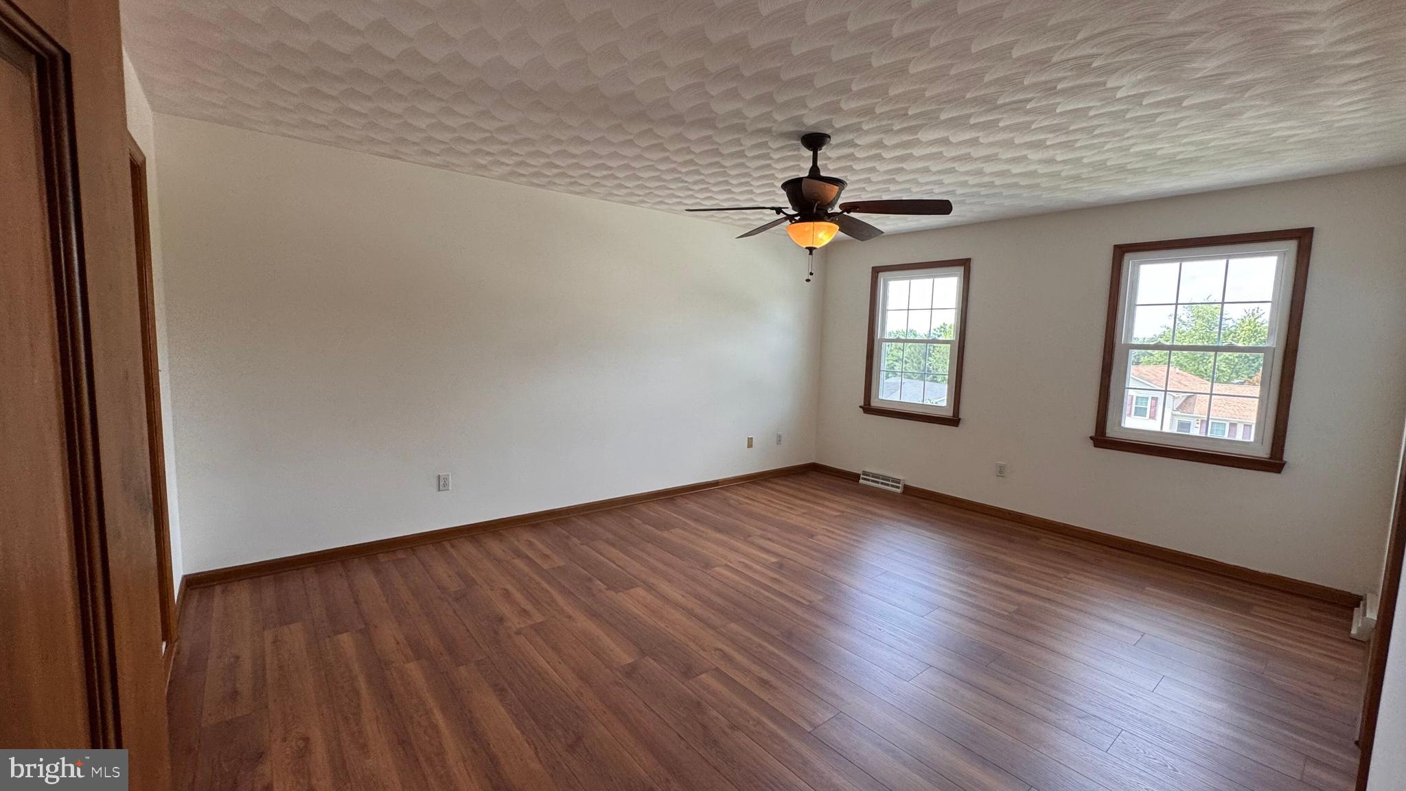 345 Jasmine Drive Hanover, PA 17331 - Photo 61 of 80 wooden floor in an empty room with a window