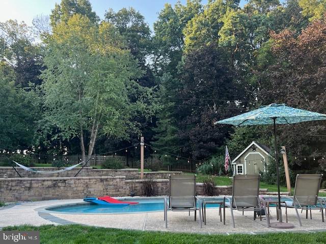 345 Jasmine Drive Hanover, PA 17331 - Photo 79 of 80 a backyard of a house with table and chairs