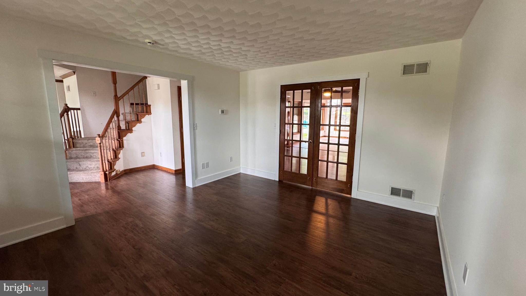 345 Jasmine Drive Hanover, PA 17331 - Photo 10 of 80 a view of an entryway with wooden floor