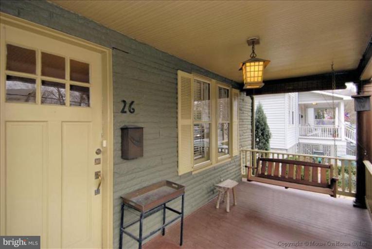 26 West Braddock Road Alexandria, VA 22301 - Photo 14 of 30 a view of an entryway with wooden floor and door